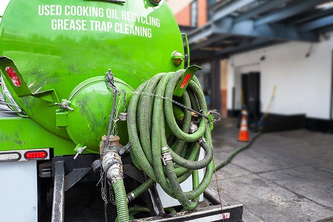 a large grease trap being pumped by a specialist in Idyllwild